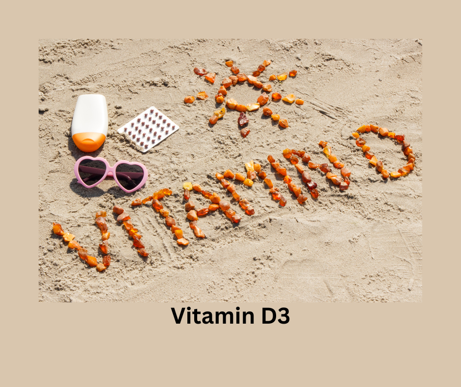 Vitamin D3 im Sand Geschrieben mit Kapseln.