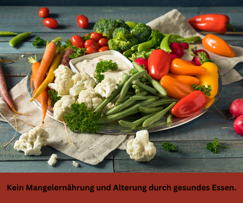 Ein Teller mit bunten Gemüse. Schriftzug: Kein Mangelernährung und Alterung durch gesundes Essen.